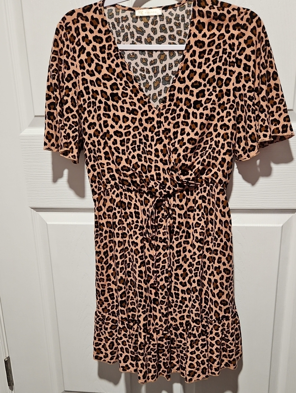 Leopard Print Wrap Mini Dress in Tan and Black